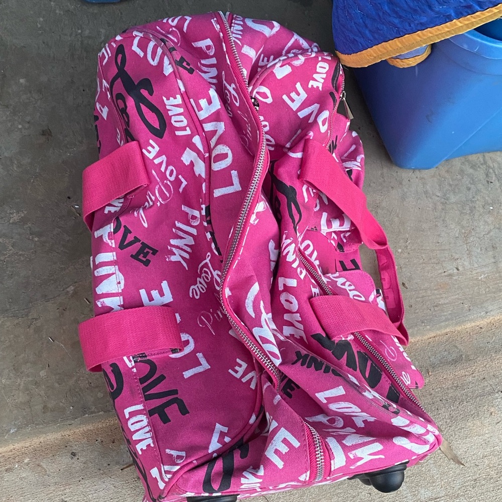 PINK rolling luggage